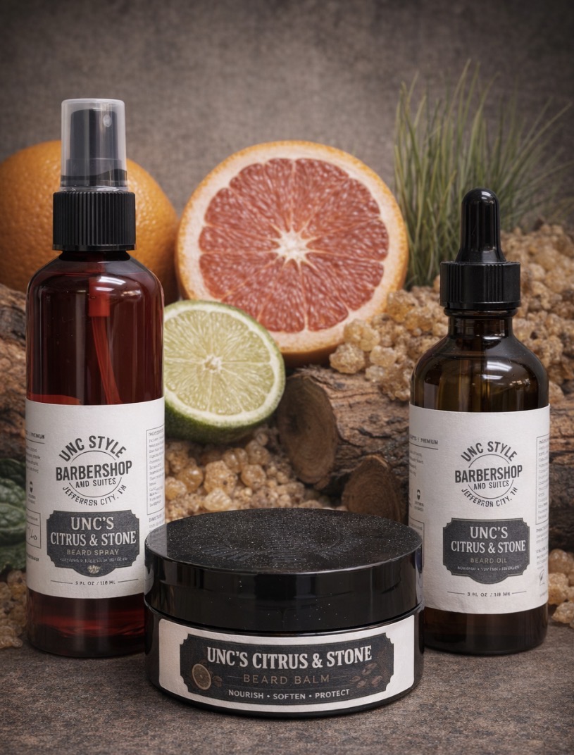 Unc's Citrus & Stone aftershave spray, beard oil dropper bottle, and beard balm jar with grapefruit, orange, lime, resin, and cedarwood