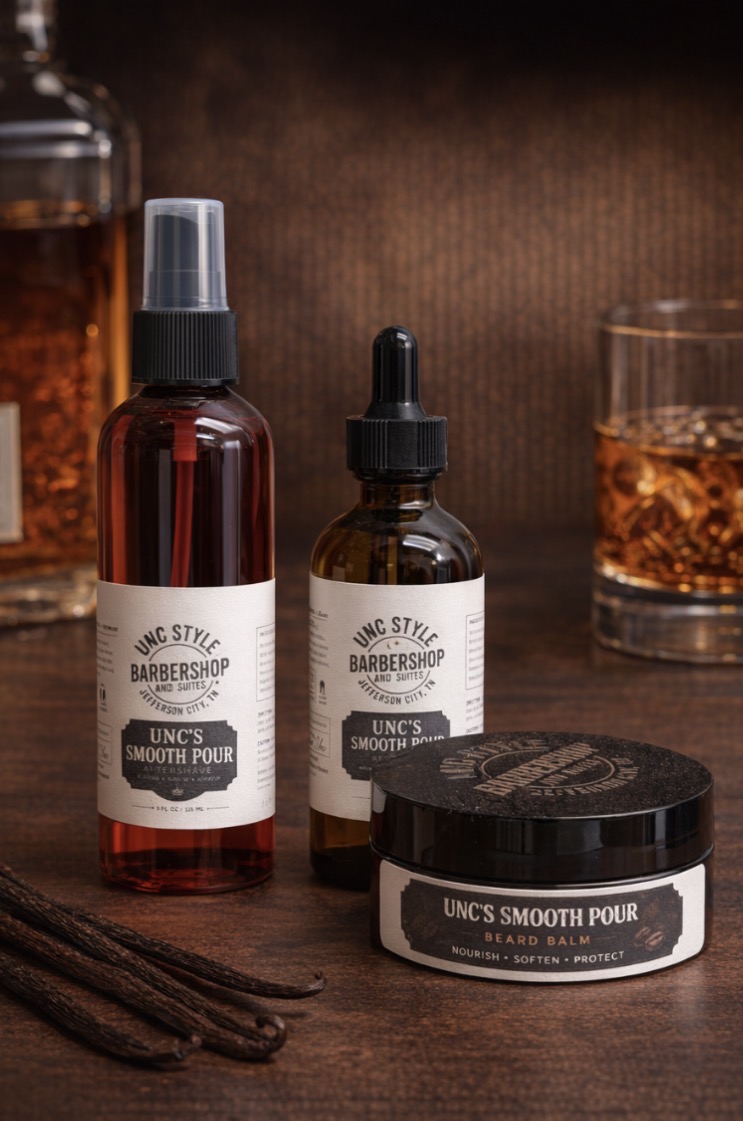 Unc's Smooth Pour aftershave spray, beard oil dropper bottle, and beard balm jar with vanilla beans and a glass of bourbon